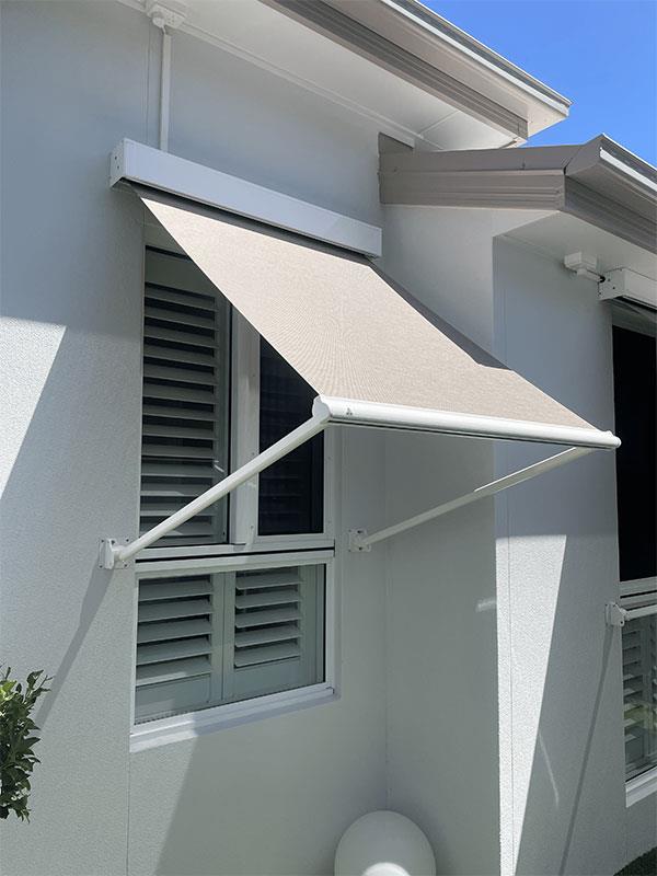 Outdoor fabric awning